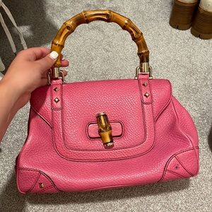 Pink Gucci hand bag with cork top handle